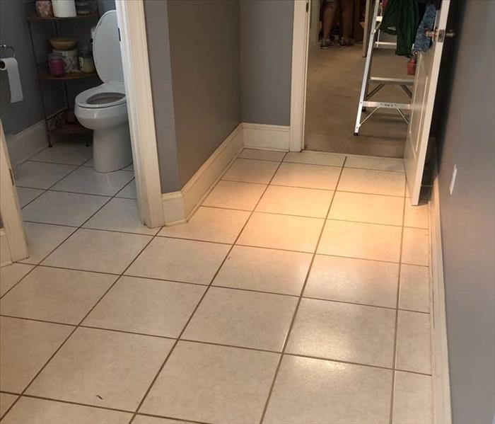 bathroom floor with water damage 